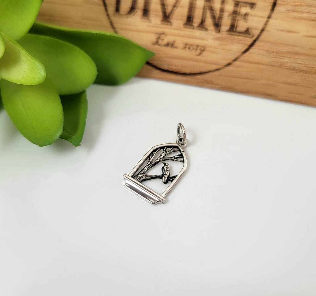 Tiny Raven on Branch Charm