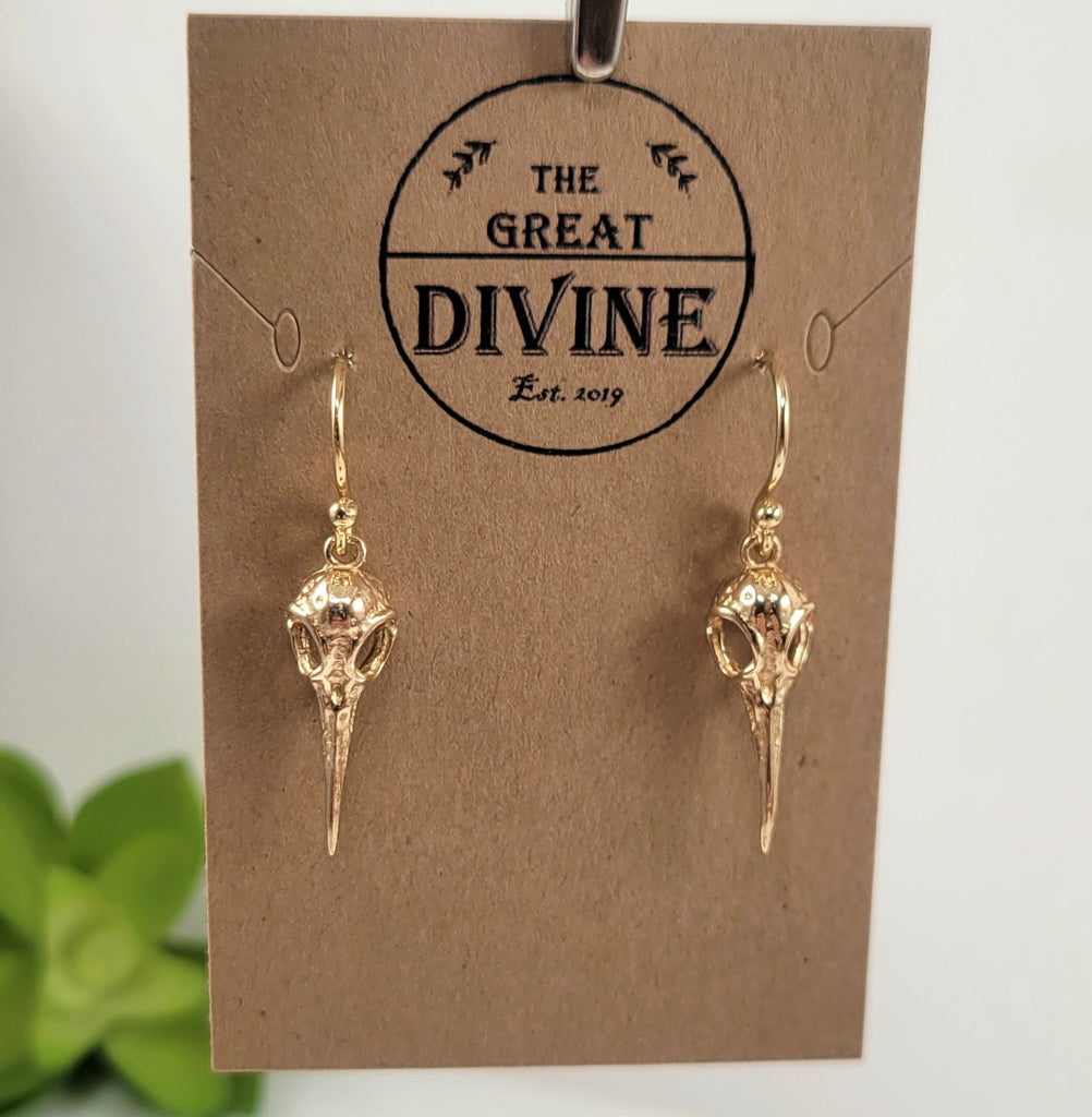 gold skull dangle earrings